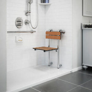 A modern walk-in safe shower with a grab bar and seat