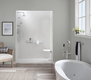 A remodeled bathroom with a tub and a walk-in shower